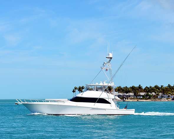 A boat in the ocean cruising along